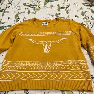 Size L, women’s gold, longhorn sweater.